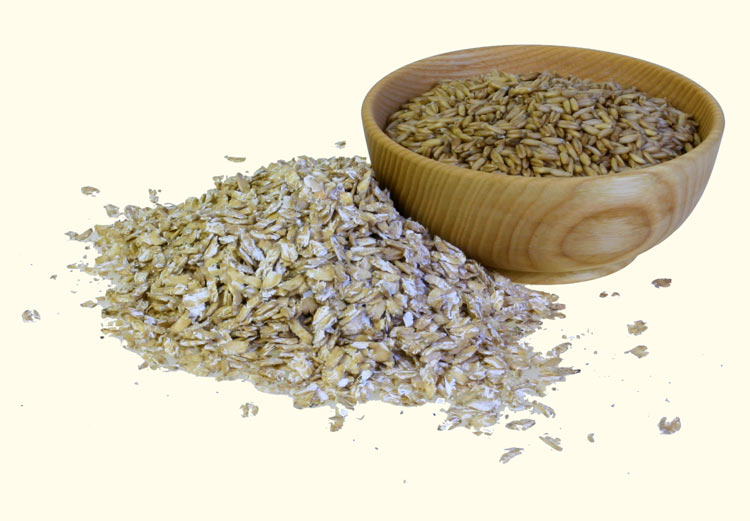 Electric flakers and hand flakers crush grain - here oat flakes